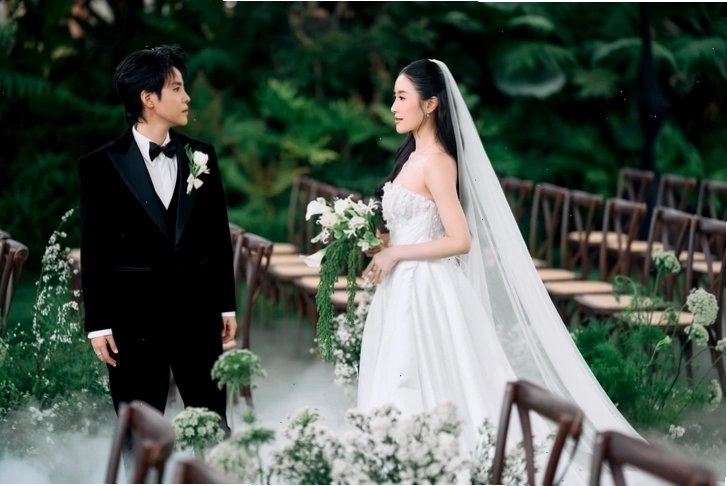 Vũ Cát Tường và bạn đời Thu Trang trong lễ thành đôi